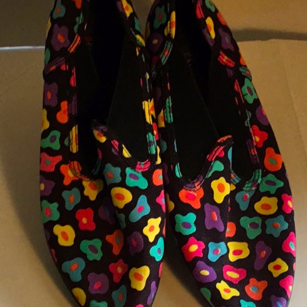Ked loafers, black, with multi colored design.